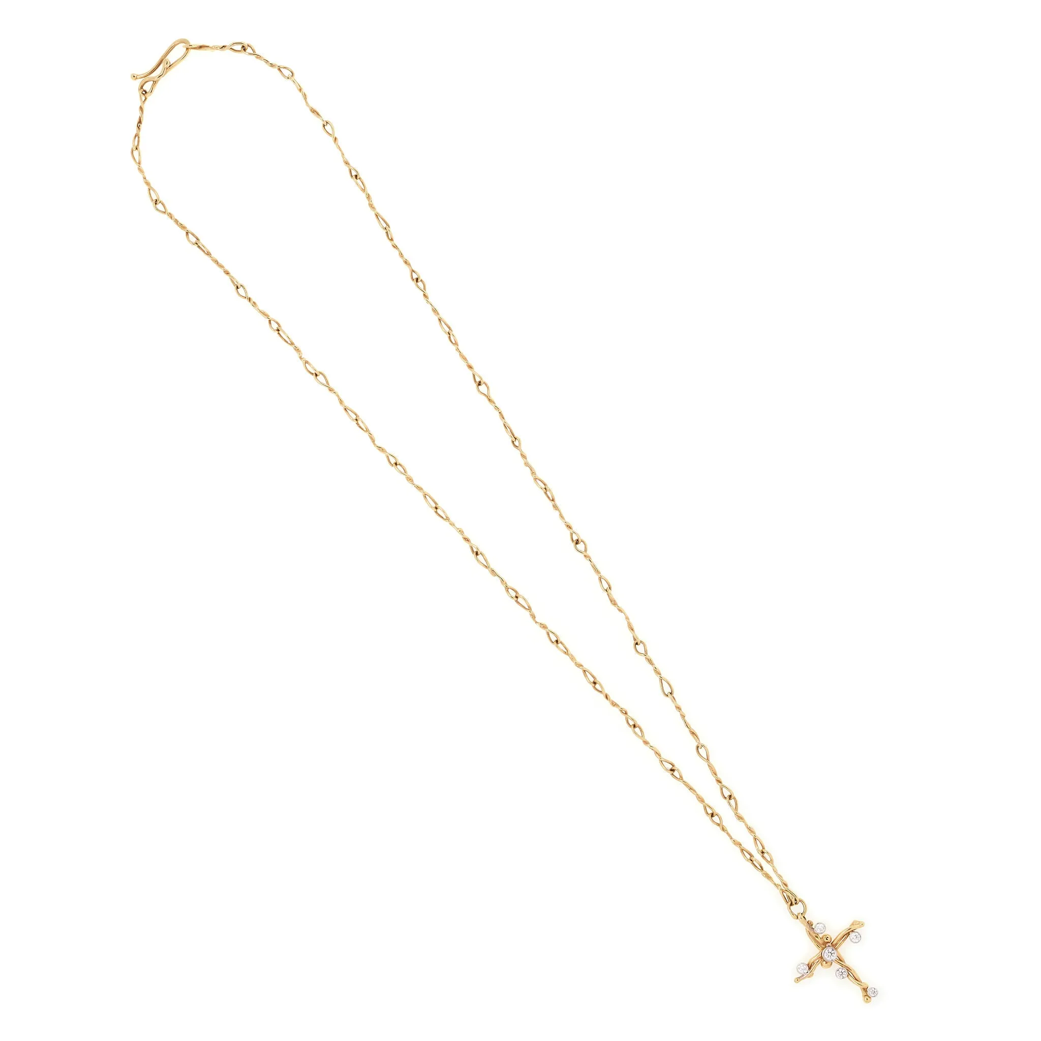 18k yellow gold small vine cross with white diamonds.