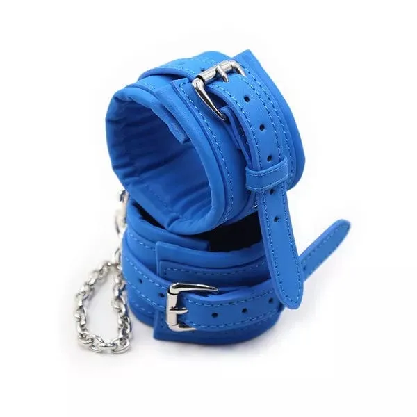 2482DL      Padded Faux Leather Tantric Blue Wrist Bondage Cuffs