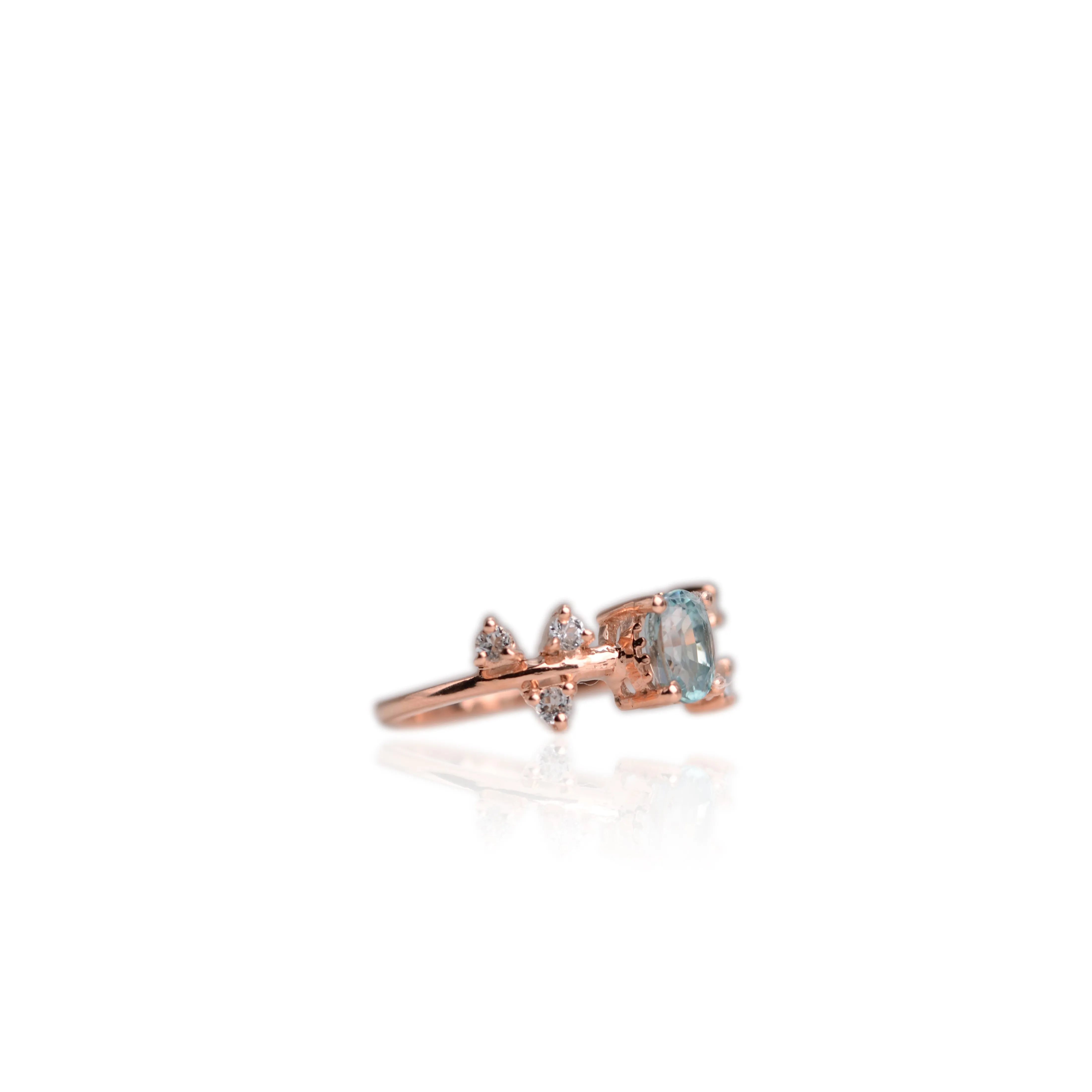 5 x 7 mm. Oval Cut Blue Cambodian Zircon with Topaz Accents Ring