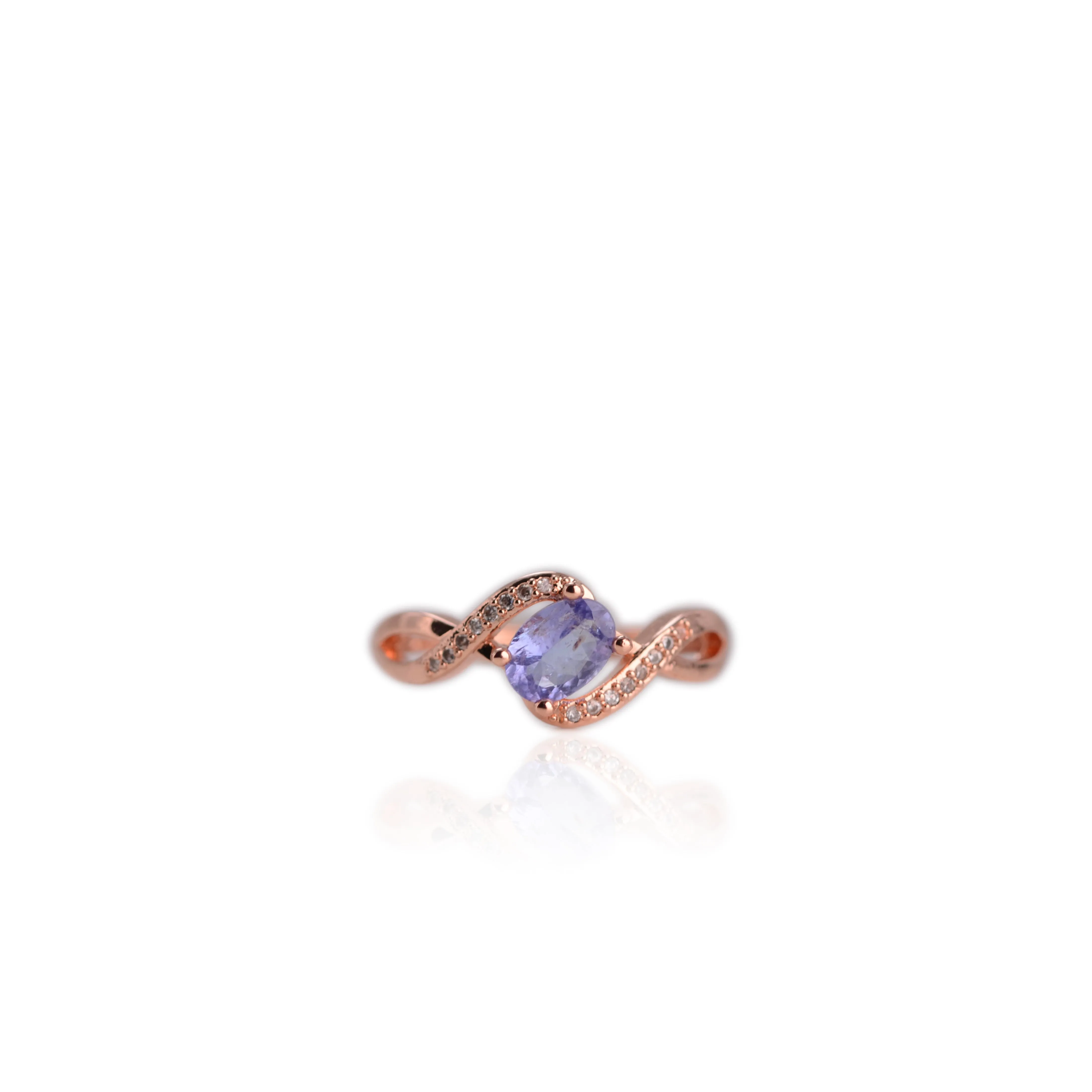 5 x 7 mm. Oval Cut Blue Violet Tanzanite with Cz Accents Ring