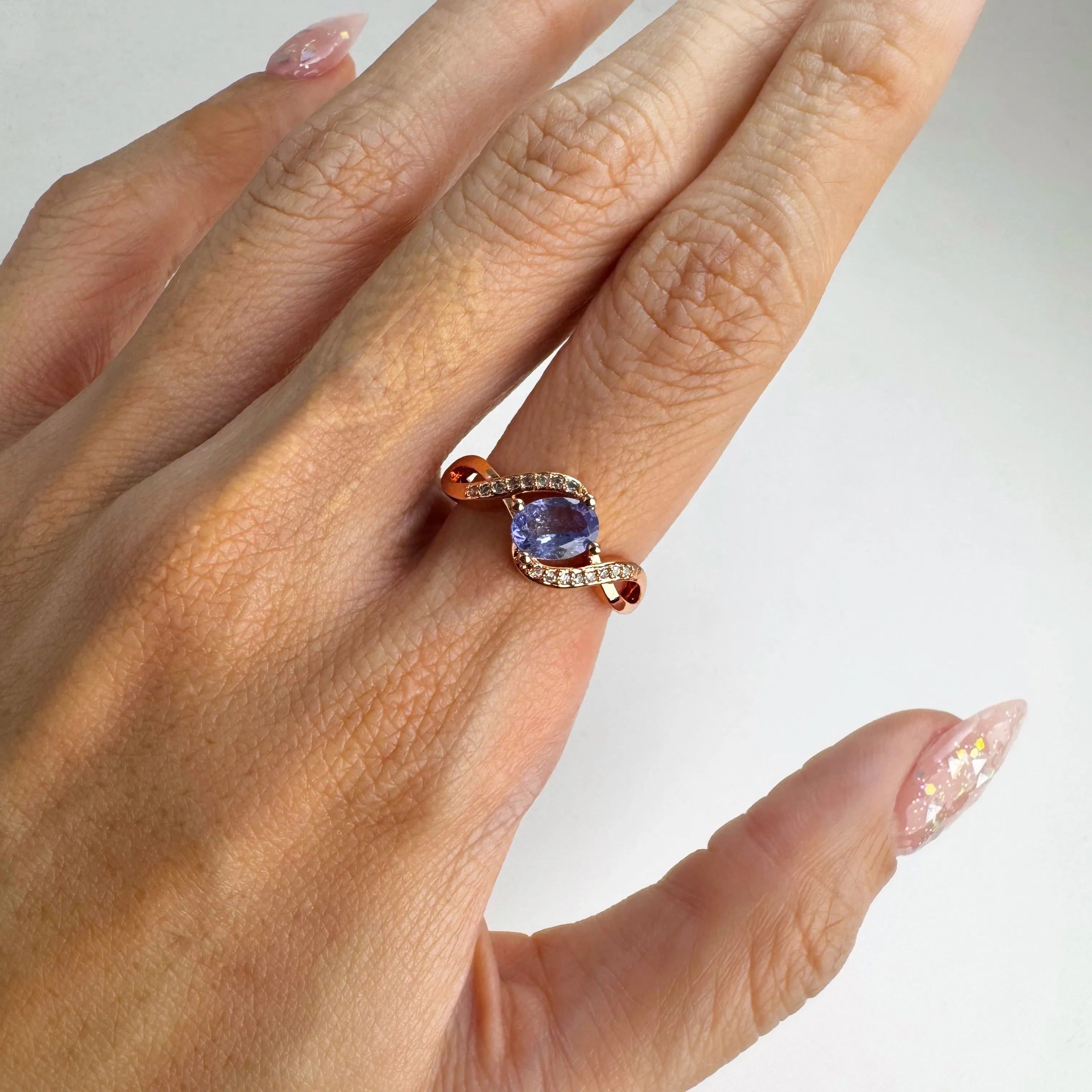 5 x 7 mm. Oval Cut Blue Violet Tanzanite with Cz Accents Ring
