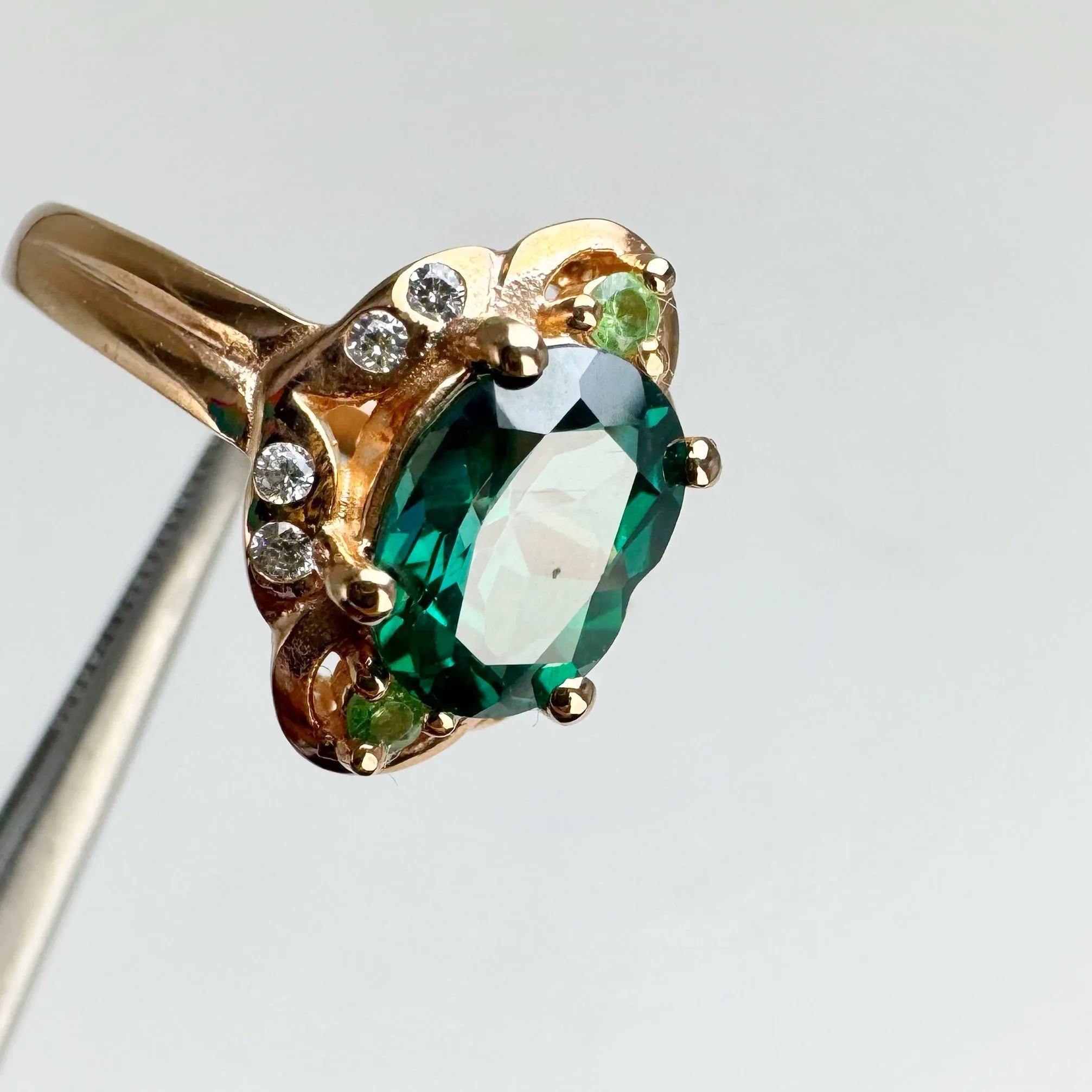 6 x 8 mm. Oval Cut Green Brazilian Mystic Topaz with Tsavorite Garnet and Cz Accents Ring