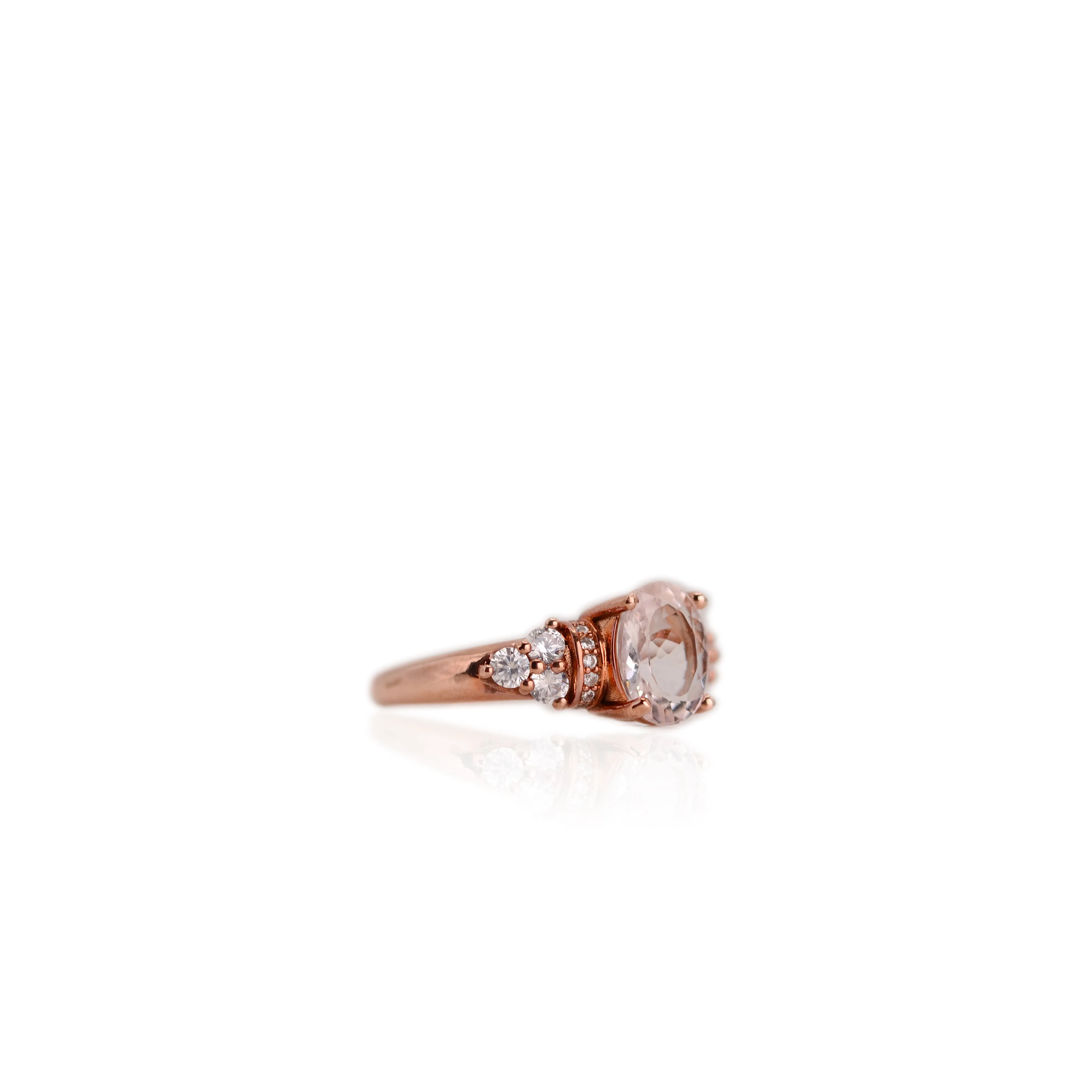 7 x 9 mm. Oval Cut White Brazilian Topaz with Cz Accents Ring