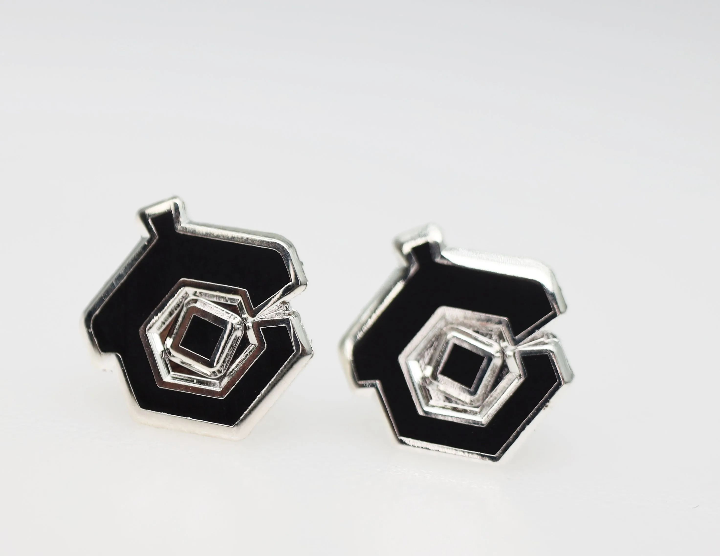 Acquisitions Inc Stud Earrings: C-Team