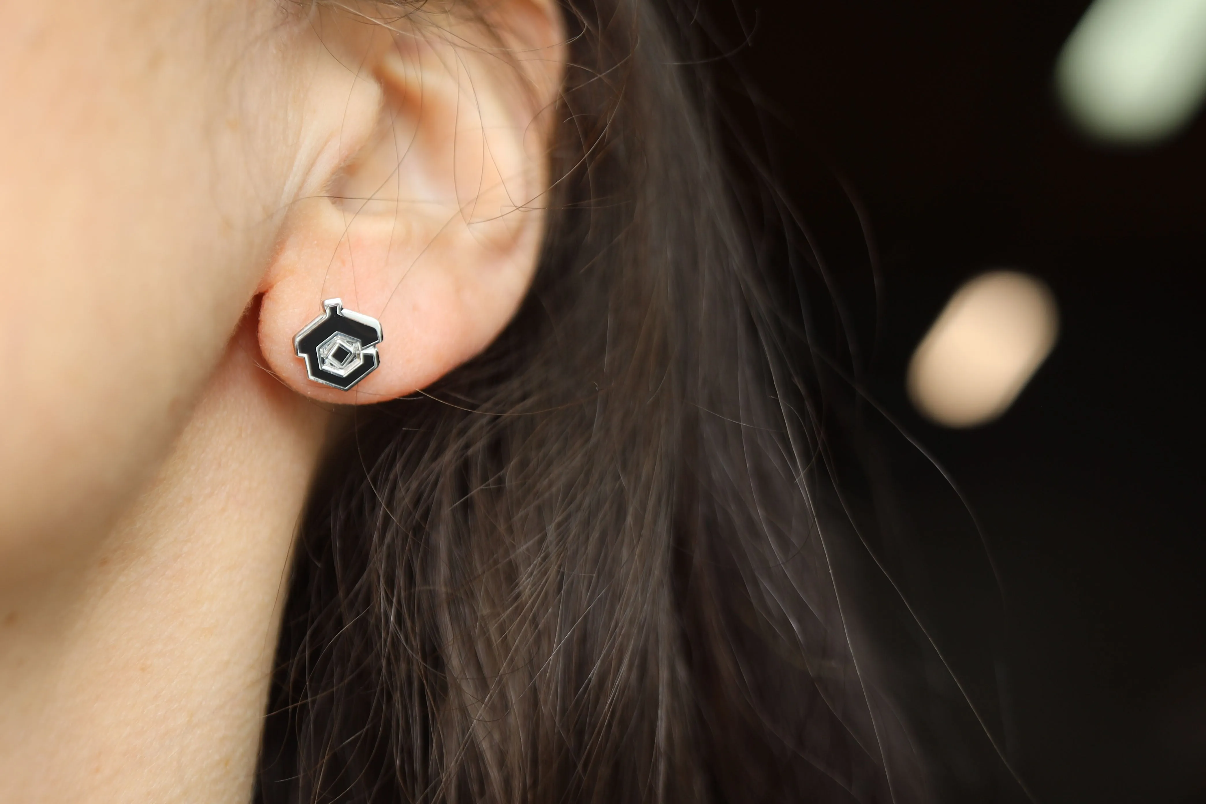 Acquisitions Inc Stud Earrings: C-Team