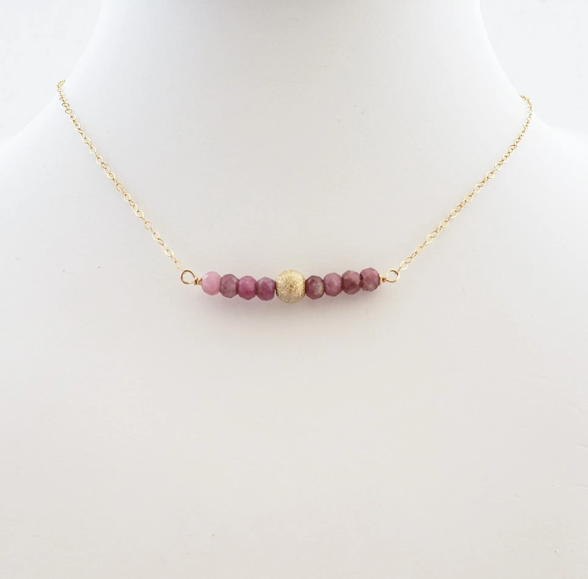 Delicate Bar Necklace Features Faceted Pink Tourmaline Surrounded By a Gold-Filled Sparkle Ball To Form On Gold-Filled Chain Encourages Unconditional Love.
