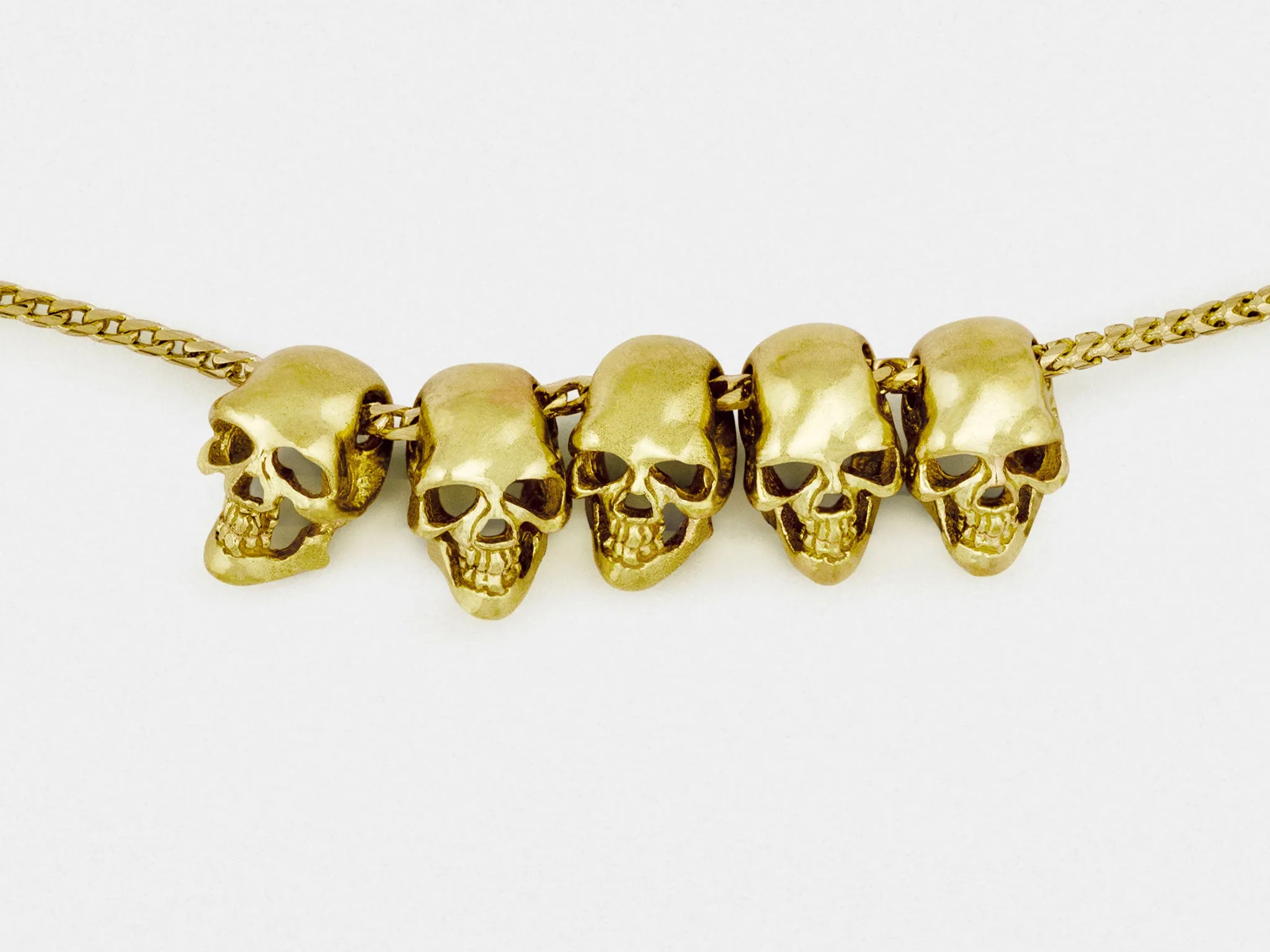 Five Skulls 18K Gold Trophy Necklace