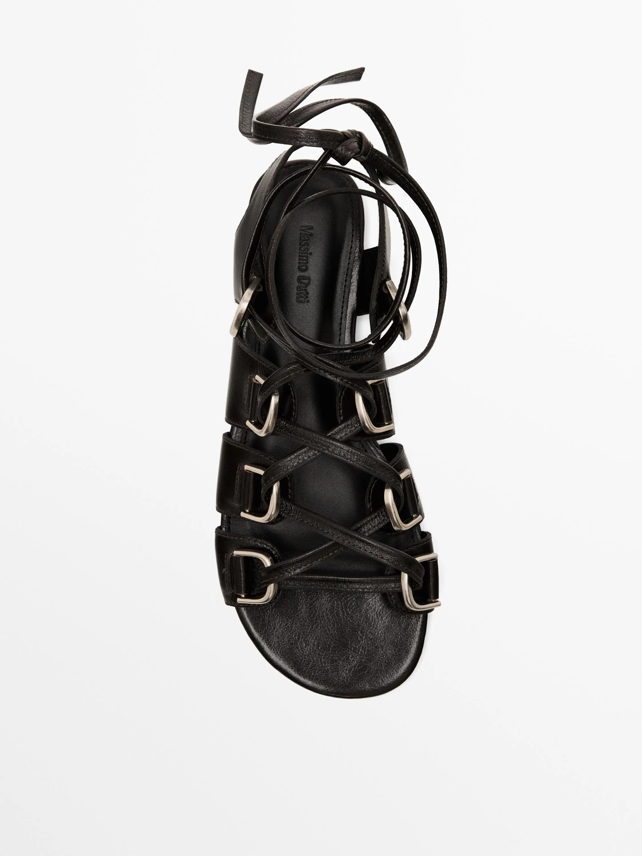 Lace-up sandals with rings