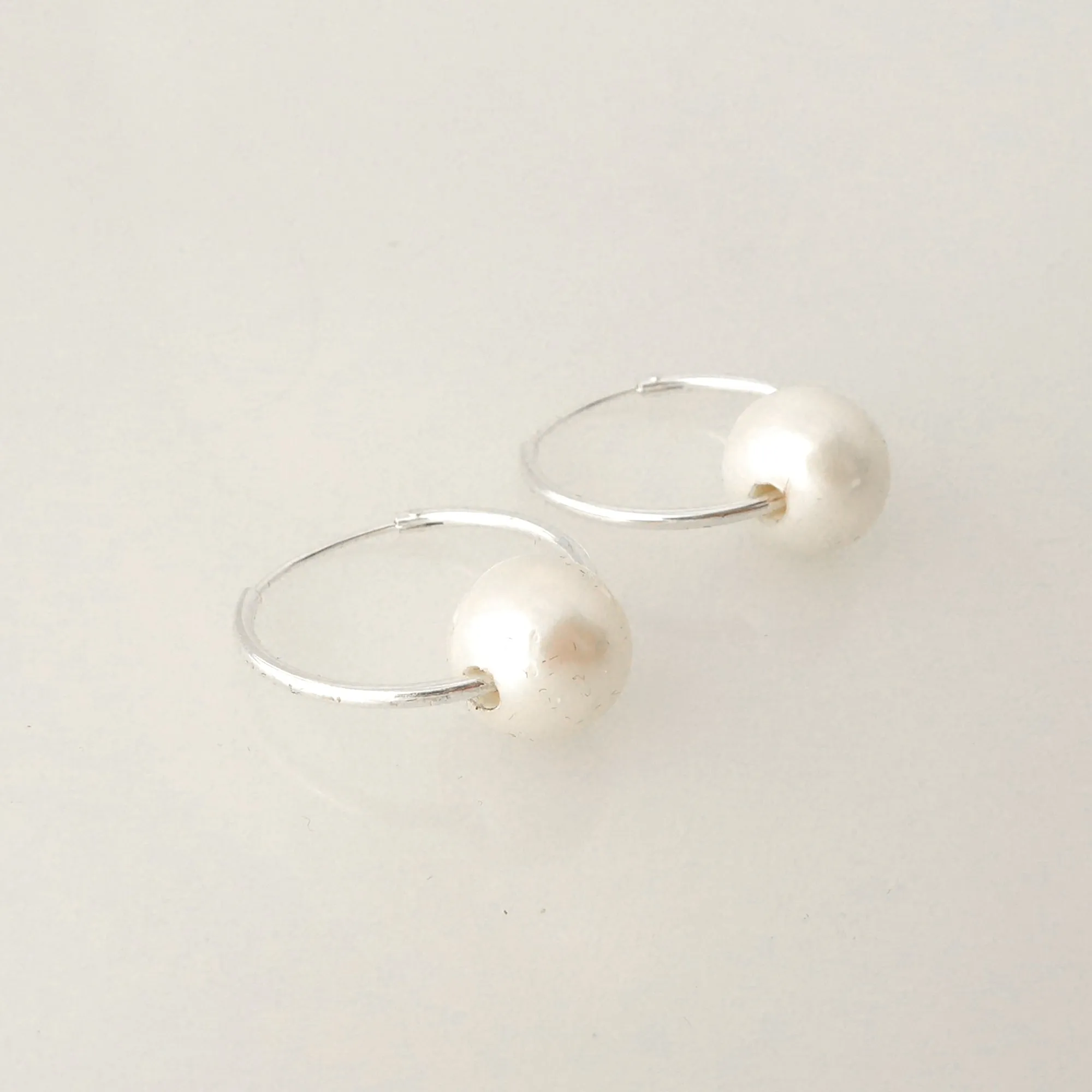 Small sterling silver pearl hoop earrings