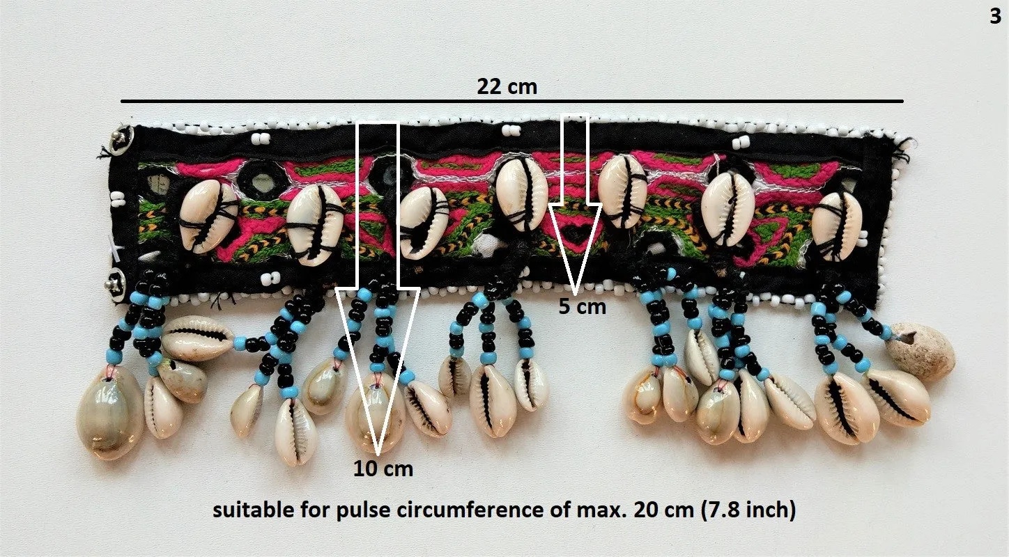 Tribal bracelet with real cowrie shell tassels
