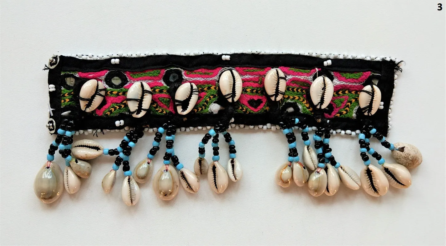 Tribal bracelet with real cowrie shell tassels