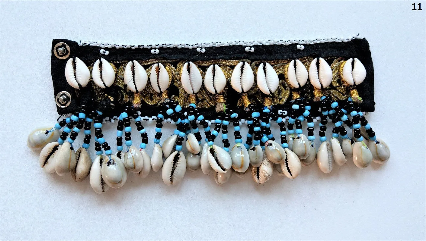Tribal bracelet with real cowrie shell tassels