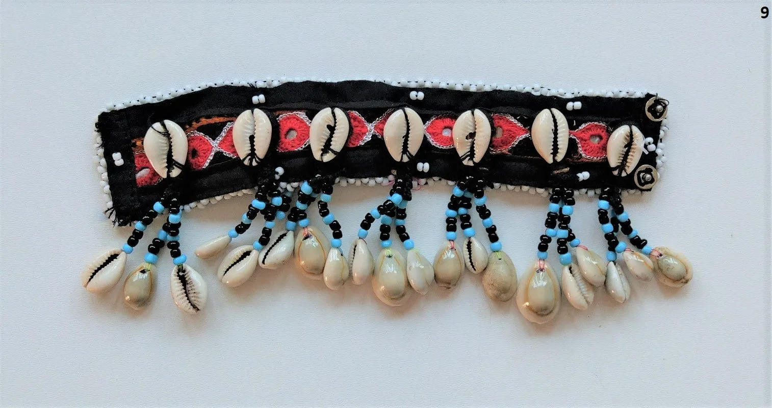 Tribal bracelet with real cowrie shell tassels