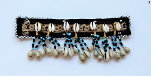 Tribal bracelet with real cowrie shell tassels
