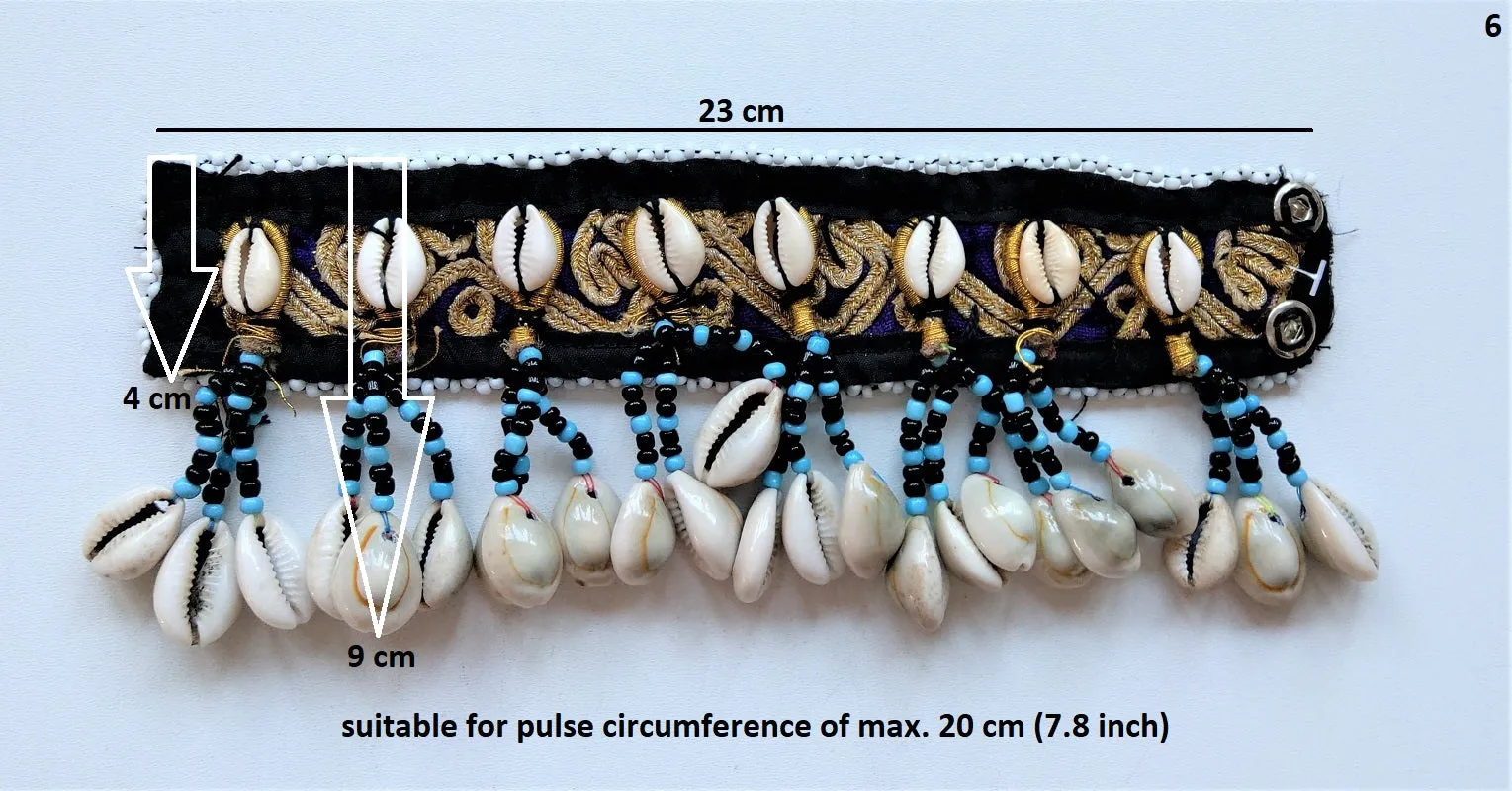 Tribal bracelet with real cowrie shell tassels