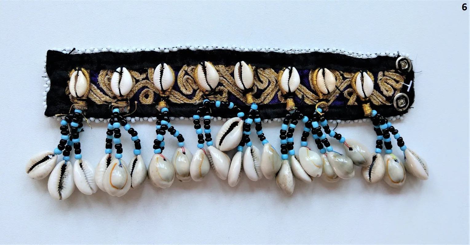 Tribal bracelet with real cowrie shell tassels