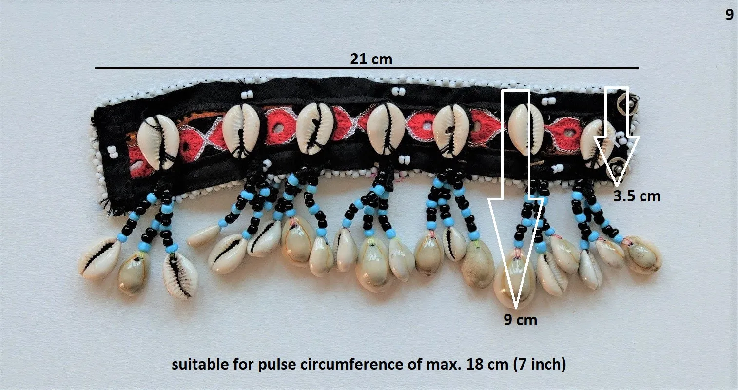 Tribal bracelet with real cowrie shell tassels
