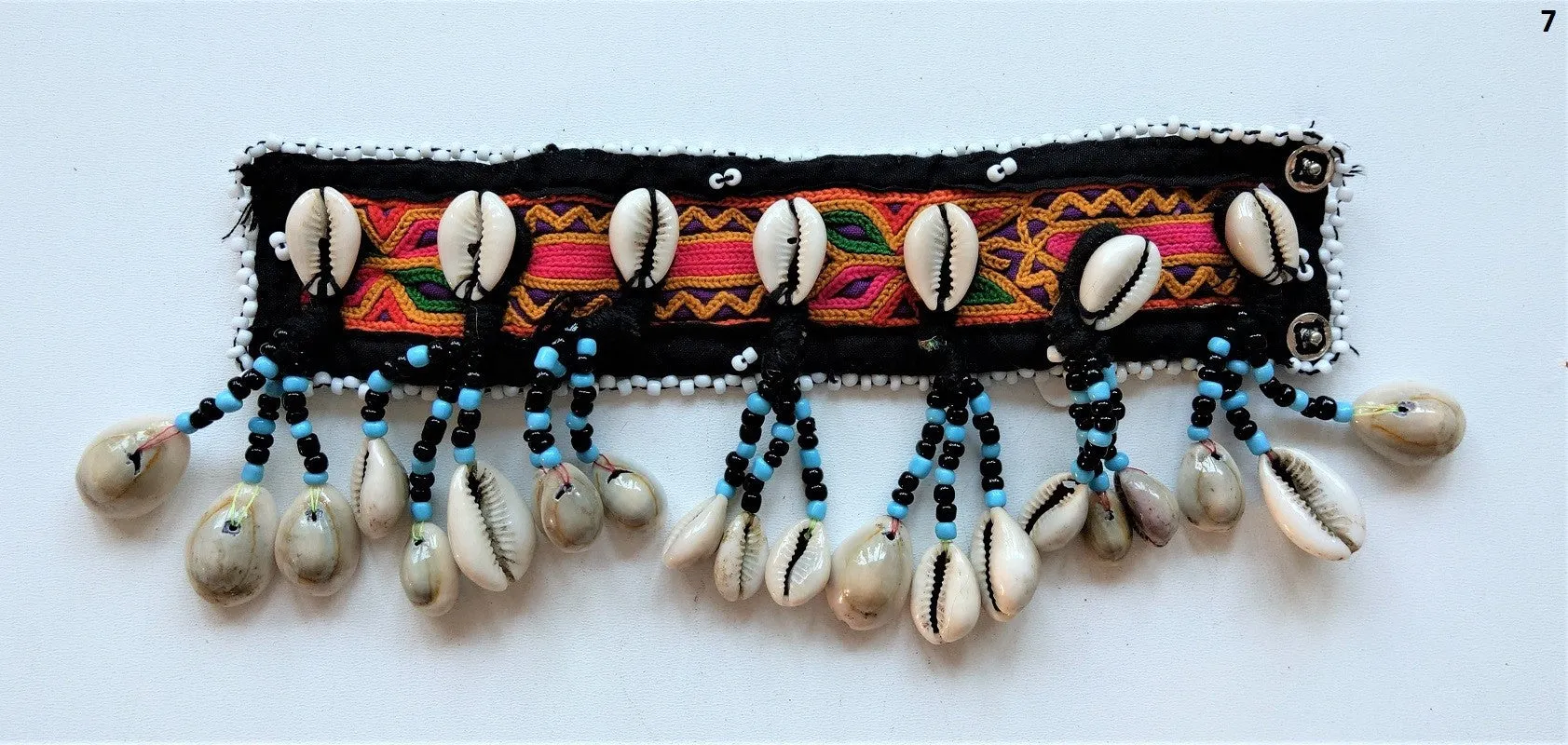 Tribal bracelet with real cowrie shell tassels